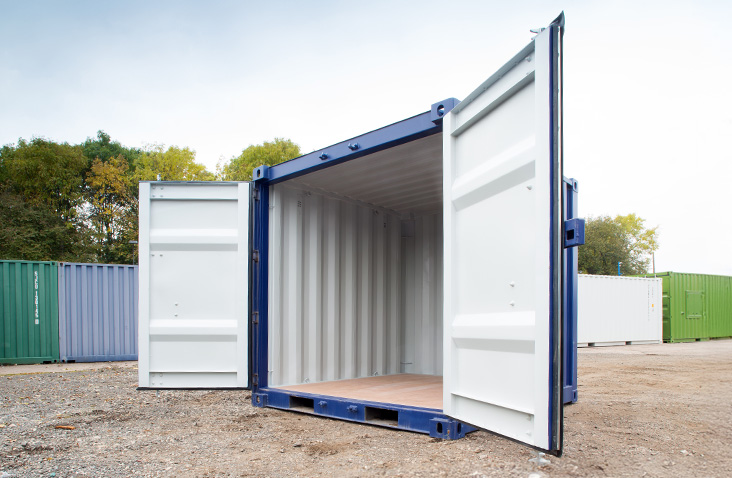 New 8ft blue shipping container with secure double doors and visible weight specification markings
