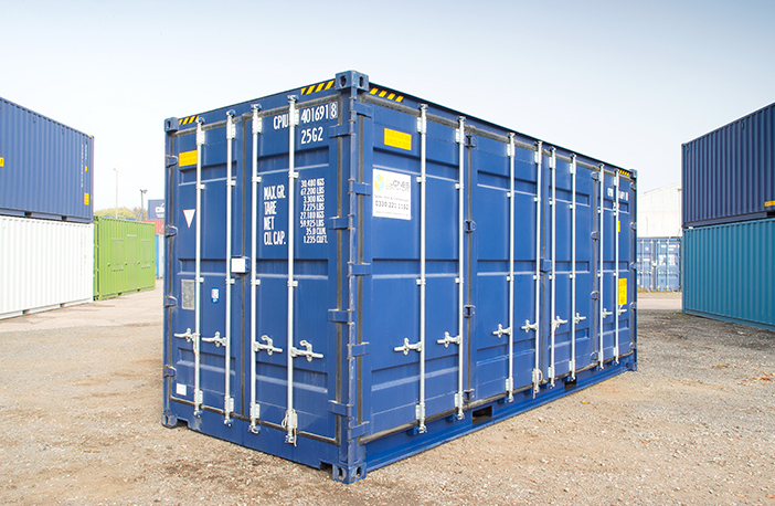     Blue 40ft high cube side opening shipping container showing both cargo and side doors closed, positioned in a storage yard with other containers in the background. 
