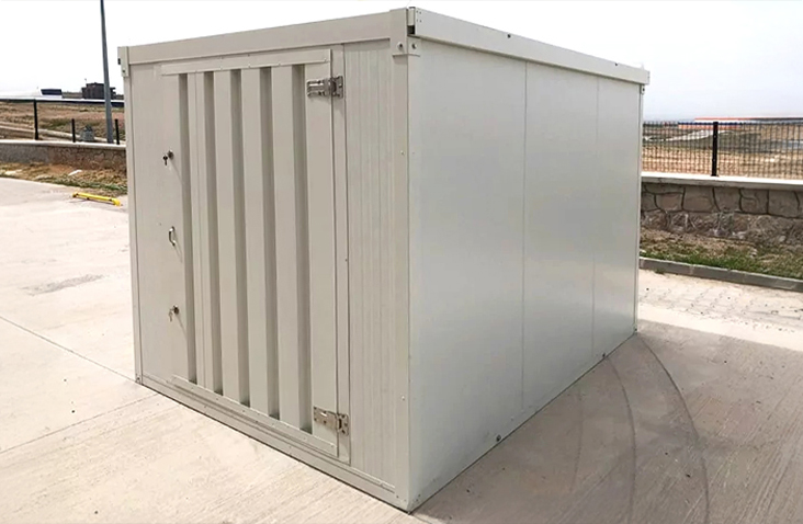     White insulated flat pack storage unit with a single door, designed for secure and temperature-sensitive storage. 