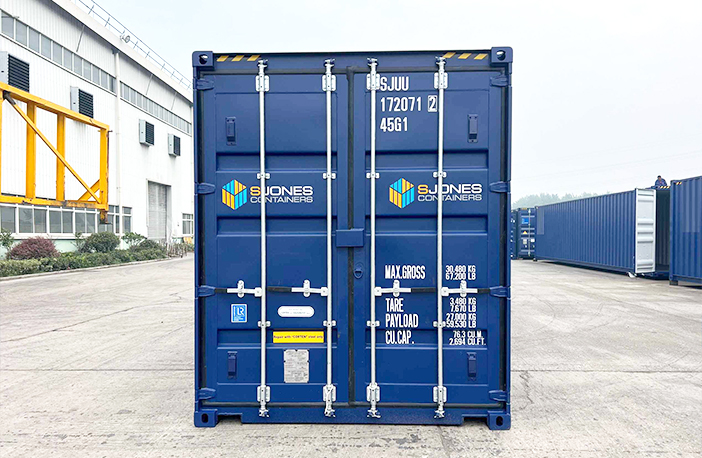 Front view of a 40ft high cube shipping container in blue, ideal for secure storage or freight transport, pictured on an industrial container yard. 