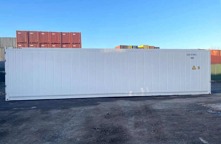 Side profile view of a 40ft white refrigerated container, showing full-length smooth exterior insulated wall panels and container identification markings. 