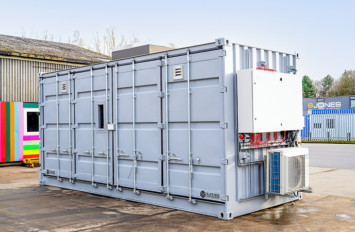 External view of a specialist battery storage unit with a blast panel and integrated climate control system, manufactured by S Jones Conversions. 