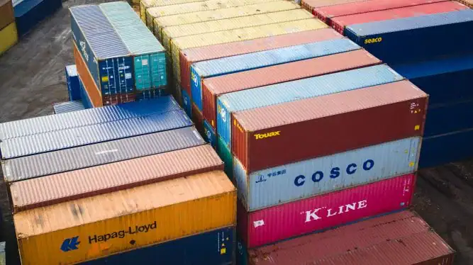 A collection of shipping containers stacked neatly