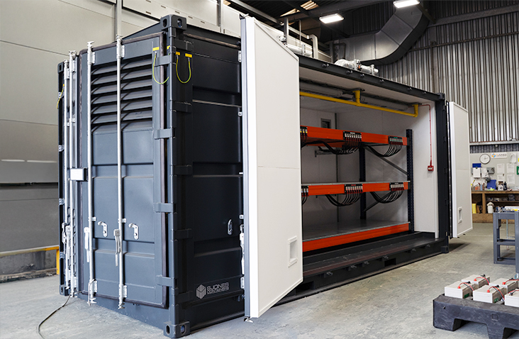 Lead-acid battery charging container with full-length access doors and internal racking system, engineered and manufactured by S Jones Conversions.