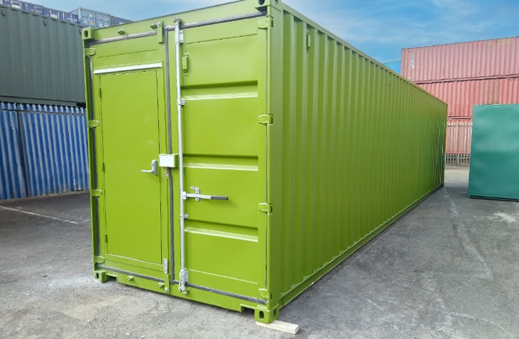 40ft green shipping container converted into a switchgear unit, showing a freshly painted container with secure double doors, reinforced structure and clean exterior finish for housing electrical switchgear equipment.
