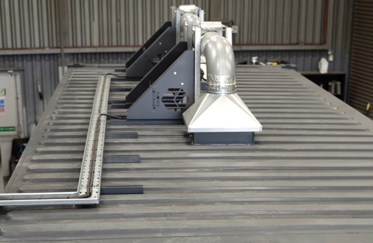 Roof-mounted ducted ATEX-rated extraction fan installed on a containerised battery storage unit, designed for safe ventilation of hazardous gases in industrial environments. 
